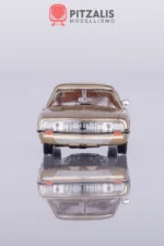 Norev 158514 Citroën SM Coupè 1972 Sabbia Metallizzato in scala H0 (1:87). Vista dell'anteriore con dettaglio della fanaleria.